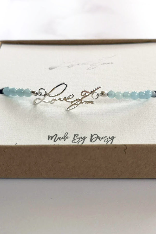 Actual handwriting of your loved ones and aquamarine gemstones