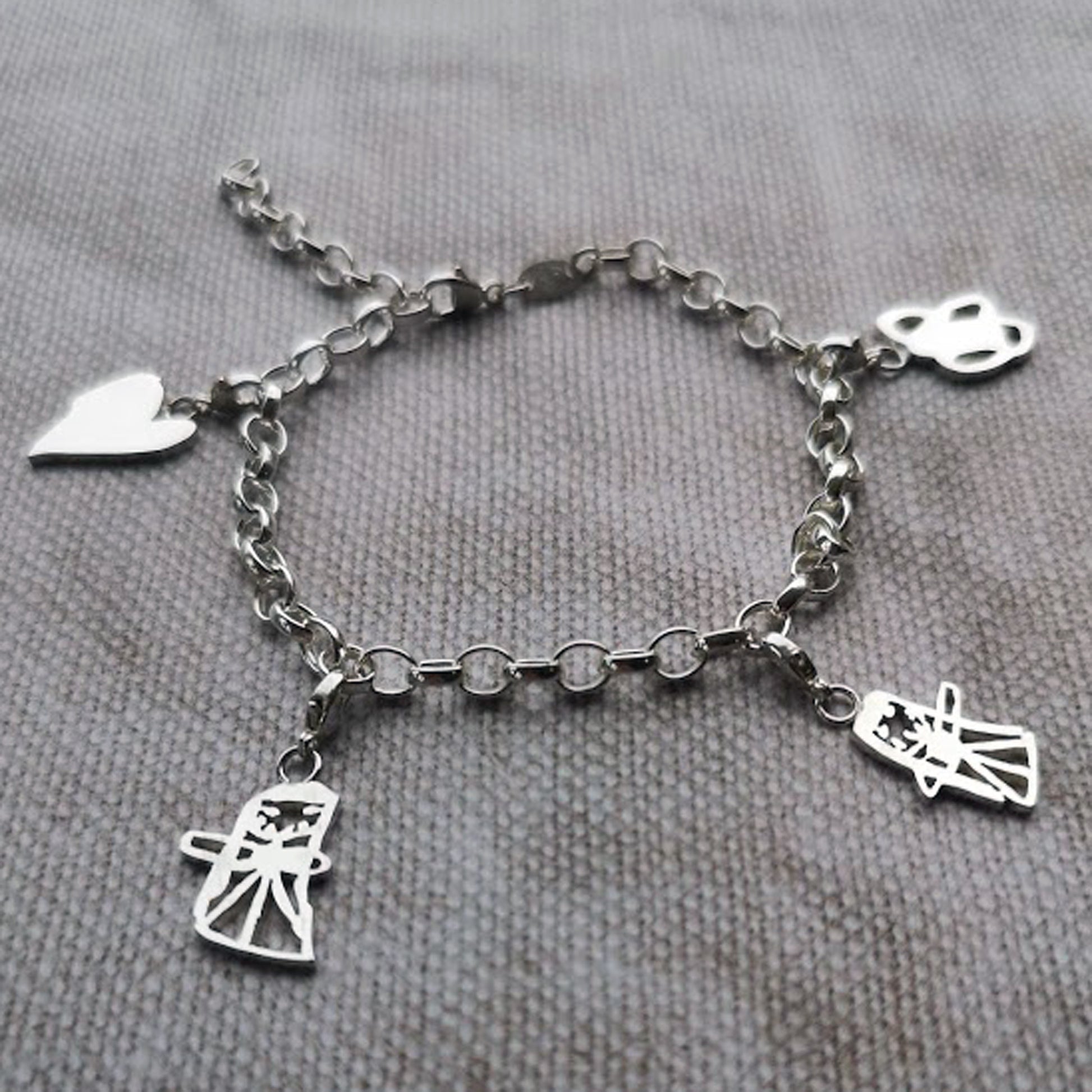 Childs artwork charm bracelet silver