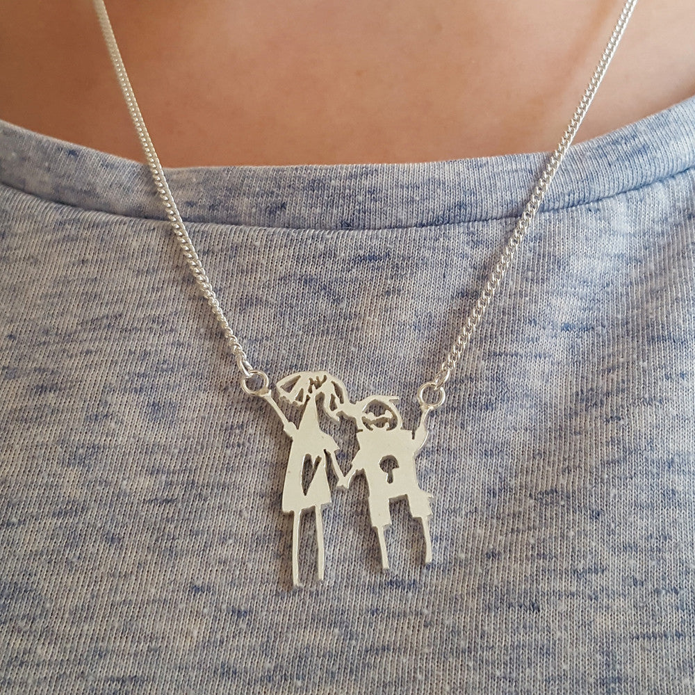 Childrens drawing handmade into keepsake necklace