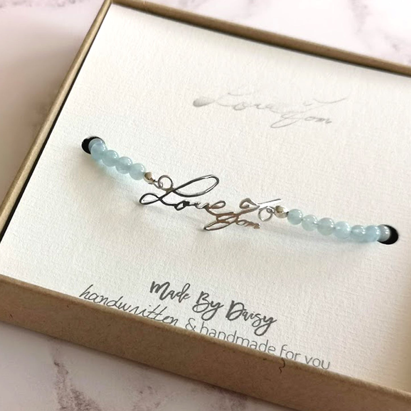 Handwriting bracelet with aquamarine